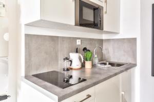 Appartements STUDIOS cosy Quartier Harteloire proche centre-ville : photos des chambres