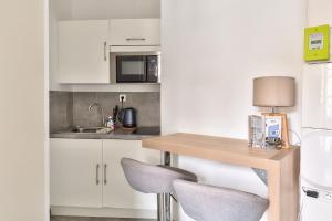 Appartements STUDIOS cosy Quartier Harteloire proche centre-ville : photos des chambres