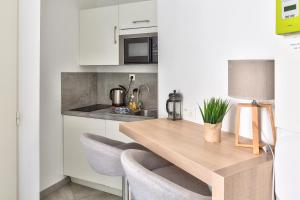 Appartements STUDIOS cosy Quartier Harteloire proche centre-ville : photos des chambres