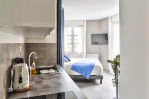 Appartements STUDIOS cosy Quartier Harteloire proche centre-ville : photos des chambres