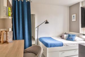 Appartements STUDIOS cosy Quartier Harteloire proche centre-ville : photos des chambres