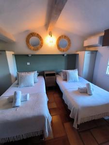 Villages vacances Les Garrigues de la Vallee des Baux : photos des chambres