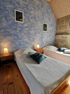 Villas Maison ancienne a Puymiclan - Clevacances 3 cles : photos des chambres