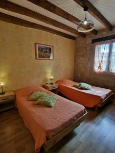 Villas Maison ancienne a Puymiclan - Clevacances 3 cles : photos des chambres