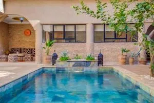 Luxe RIAD-privé-RIAD MIMI centre-ville - Tiout