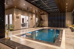 ELIVAAS Jamun Farm 2BHK with Pool