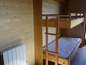 Appartements Belle roulotte de style chalet au coeur du Sancy : photos des chambres