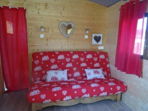 Appartements Belle roulotte de style chalet au coeur du Sancy : photos des chambres