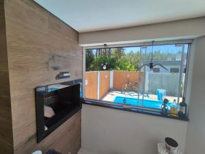 Casa com Piscina, Quiosque, Próximo ao Mar