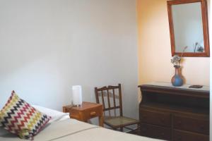Habitación en Ciudad con baño privado en suite y cochera