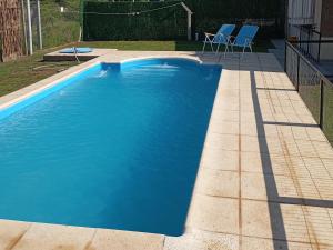 CASA quinta ""LUZ AZUL"" con pileta, galeria, calefaccion , doble aire frío calor, WIFI