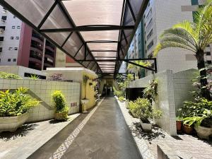 Frente Mar com garagem, Ar Condicionado e WI-FI grátis em Santos