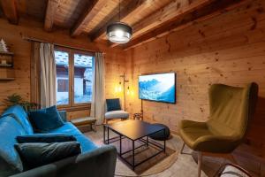 Chalets Chalet Veyrier, 900m du pied des pistes de ski : photos des chambres
