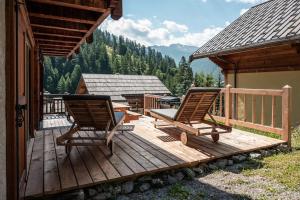 Chalets Chalet Veyrier, 900m du pied des pistes de ski : photos des chambres