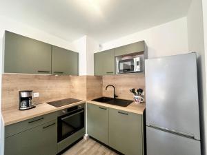 Résidence Le Living Stone B - PARKING-PROCHE PISTES-COEUR DE STATION-Tout inclus MAE-7981