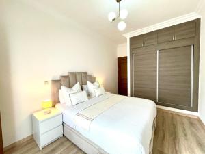 Appartement Cosy à Malabata Plage - Bord de mer et Gare TGV 3 à pied, Tanger City Mall à 2 à pied - Parking, WIFI, IPTV, AC