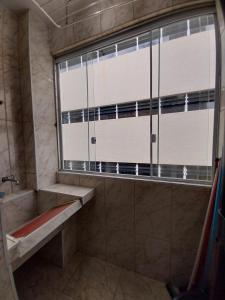 Bitenca pé na areia