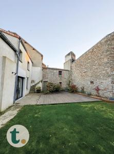 Maisons de vacances Tranquiloue - Maison au charme d-Antan - PuyduFou : photos des chambres