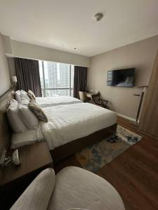 The Metro Zen at Hotel Residences Acqua - Novotel Tower