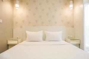 Comfort 1BR at The Mansion Kemayoran Apartment By Travelio