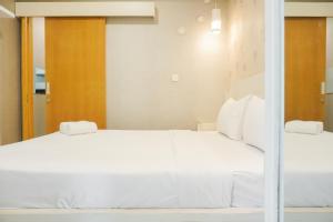 Comfort 1BR at The Mansion Kemayoran Apartment By Travelio