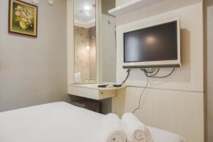 Comfort 1BR at The Mansion Kemayoran Apartment By Travelio