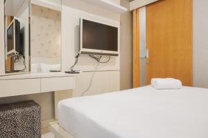 Comfort 1BR at The Mansion Kemayoran Apartment By Travelio