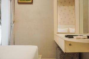 Comfort 1BR at The Mansion Kemayoran Apartment By Travelio