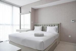 Stunning and Comfy 1BR at Ciputra World 2 Apartment By Travelio