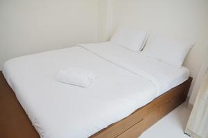 Comfort and High Floor Studio at Brooklyn Alam Sutera Apartment By Travelio