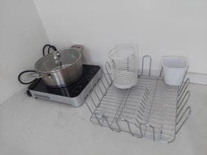 Comfort and High Floor Studio at Brooklyn Alam Sutera Apartment By Travelio