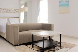 Warm and Cozy Studio at Azalea Suites Apartment By Travelio