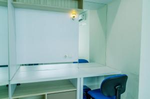 Comfort 1BR at Brooklyn Alam Sutera Apartment By Travelio