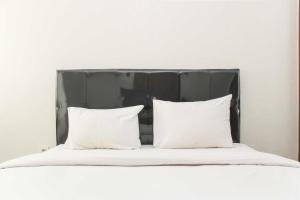 Nice and Elegant Studio at Riverview Jababeka Apartment By Travelio