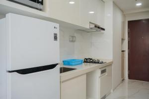 Minimalist Studio at Sky House BSD Apartment By Travelio