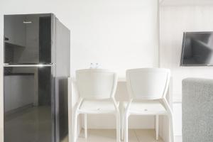 Minimalist and Homey 1BR at Belmont Residence Puri Apartment By Travelio