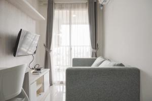 Minimalist and Homey 1BR at Belmont Residence Puri Apartment By Travelio