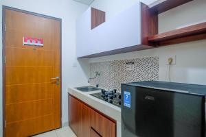 Homey and Comfort Living Studio Room at Dave Apartment By Travelio