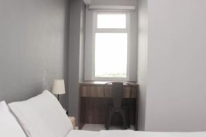 Modern 2BR at Springlake Summarecon Bekasi Apartment By Travelio