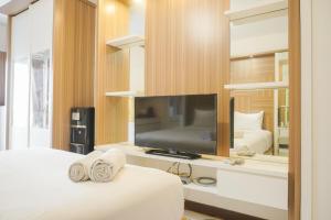 Nice and Cozy Studio at Cinere Resort Apartment By Travelio