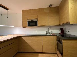 Central flat in Villars sur Ollon, Amethyste, for 4, with two double beds, balcony and 75m to ski-train