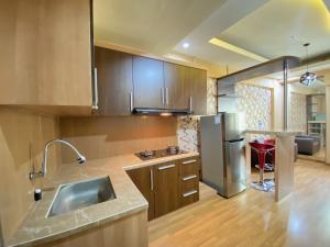 Spacious and Private 1BR Apartment Suites @Metro By Travelio