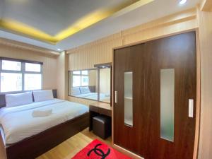 Spacious and Private 1BR Apartment Suites @Metro By Travelio