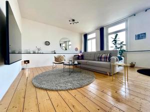 Apartment "Am Rheinorange" LOFTSTYLE, 75 Zoll TV, Netflix & Prime, Boxspringbett