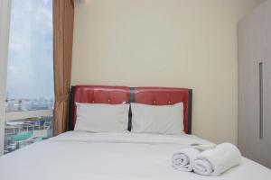 Nice and Spacious 3BR at Menteng Park Apartment By Travelio