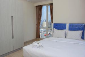 Nice and Spacious 3BR at Menteng Park Apartment By Travelio