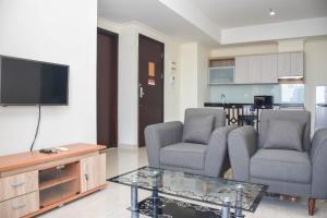 Nice and Spacious 3BR at Menteng Park Apartment By Travelio