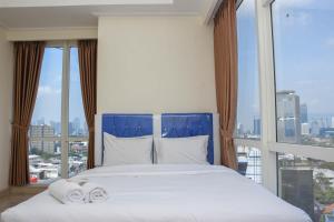 Nice and Spacious 3BR at Menteng Park Apartment By Travelio