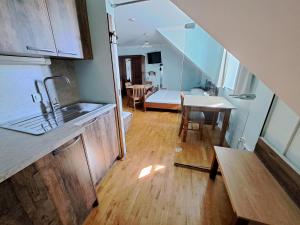 Superior Triple Room with Kitchenette room in Guest House Parma