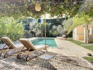 Villas Charming villa with pool, ideal family holiday : photos des chambres